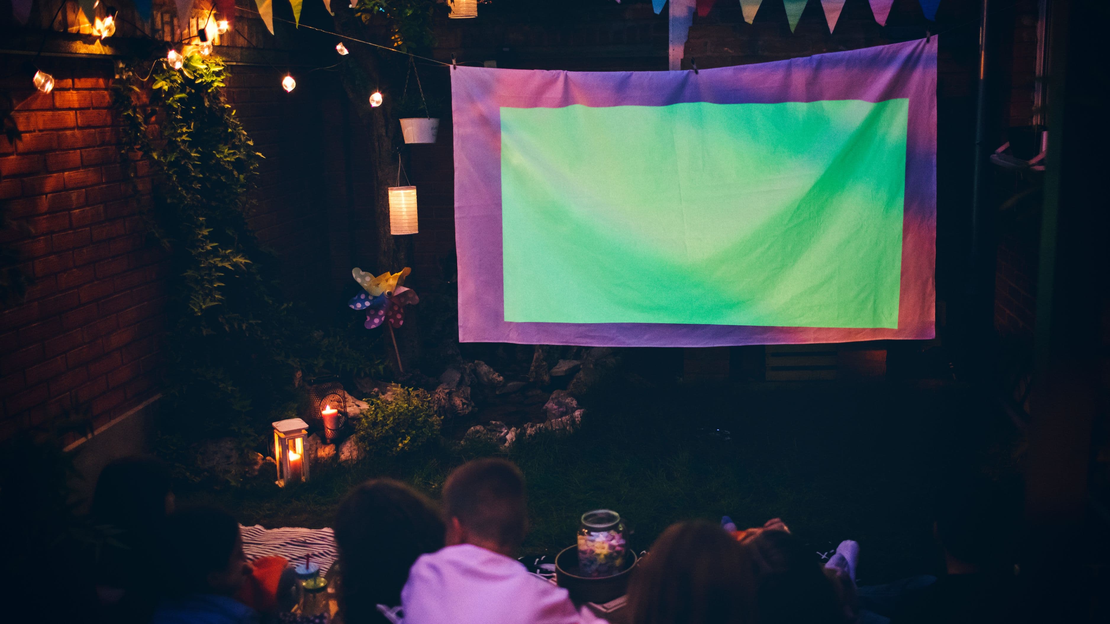 How to Set Up Outdoor Movie Nights with a Portable Projector